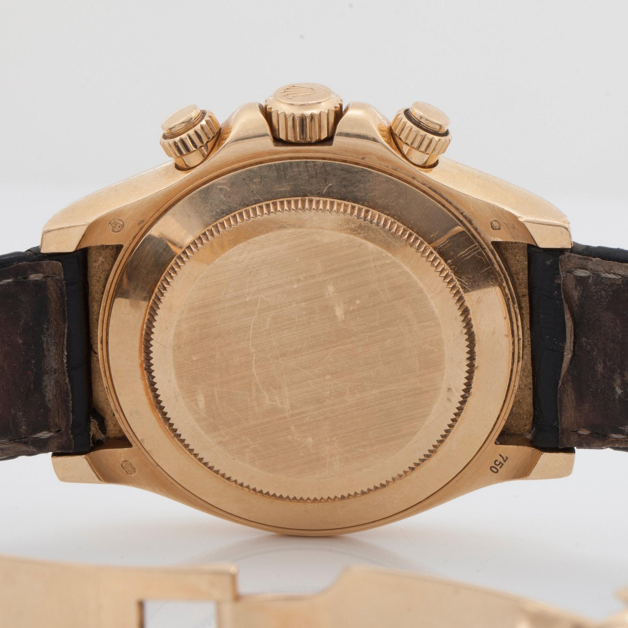HERRUR, Rolex Daytona Cosmograph. Automatisk. Pärlemotavla. Ø 40 mm. Boett och spänne i 18K guld.