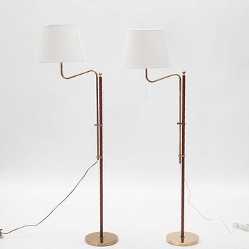 A pair of brass model G 132 floor lamps from Bergboms, end of the 20th Century.