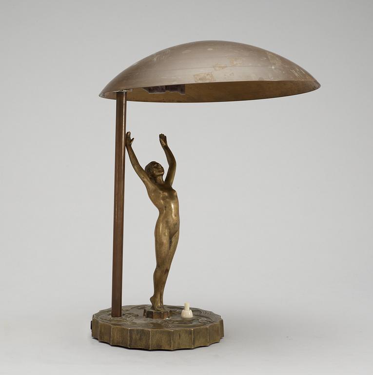 A bronze table lamp.