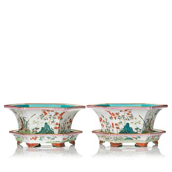 1010. A pair of famille rose flower pots with stands, probably Republic, China, 20th Century.