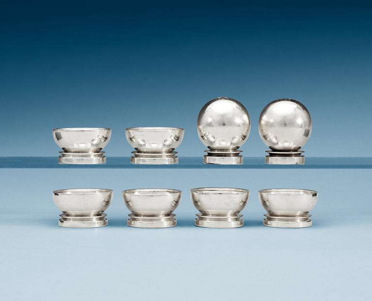 A set of six Harald Nielsen sterling salt cellars and a pair of spice jars, 'Pyramid', Georg Jensen, Copenhagen 1933-44.