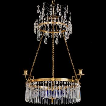 A late Gustavian five-light gilt brass and cut glass chandelier, Stockholm, late 18th century.
