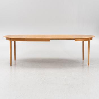 An oak dining table, second half of the 20th century.