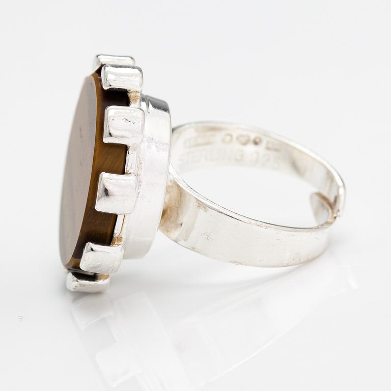 H Palmberg, A sterling silver ring with a tiger's eye. Alton, Falköping 1975.