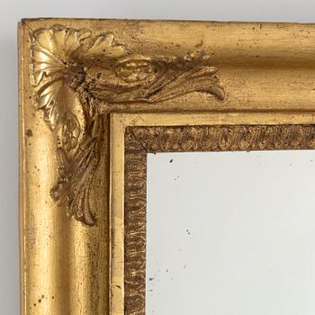 A mid 19th century empire gilt wood wall sconce for two candles.