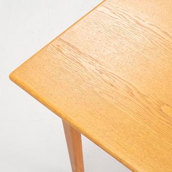 A dining table, 1960s.