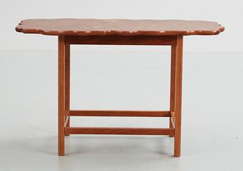 A Josef Frank cherry and burrwood table, Svenskt Tenn, model 1058.