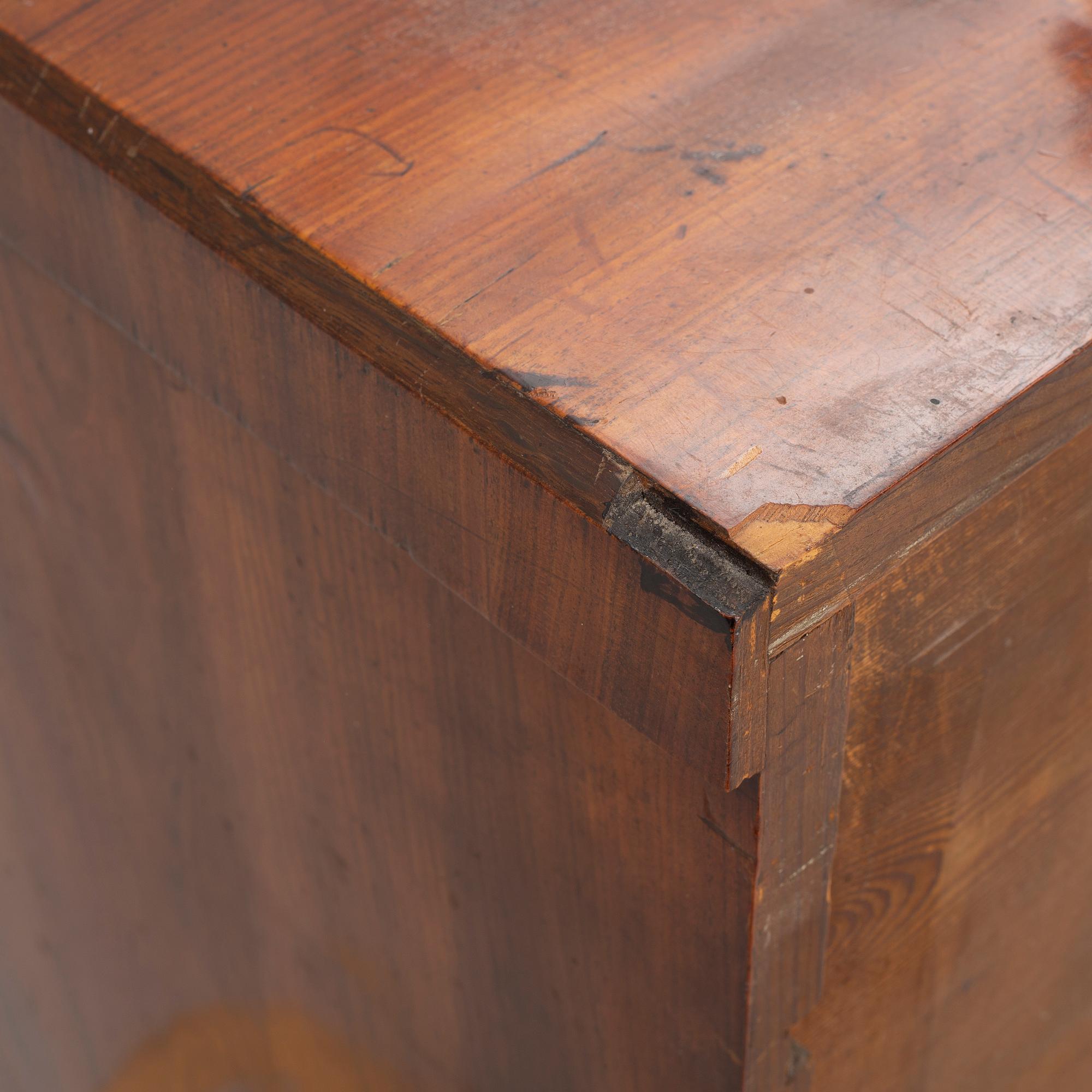 An Empire chest of drawers, first half of the/mid 19th century.