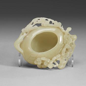 193. A nephrite brush washer, late Qing Dynasty (1644-1912).