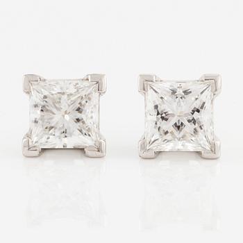 A pair of 18K white gold Gaudy earrings with two princess-cut diamonds accompanied by three sets of pendants.