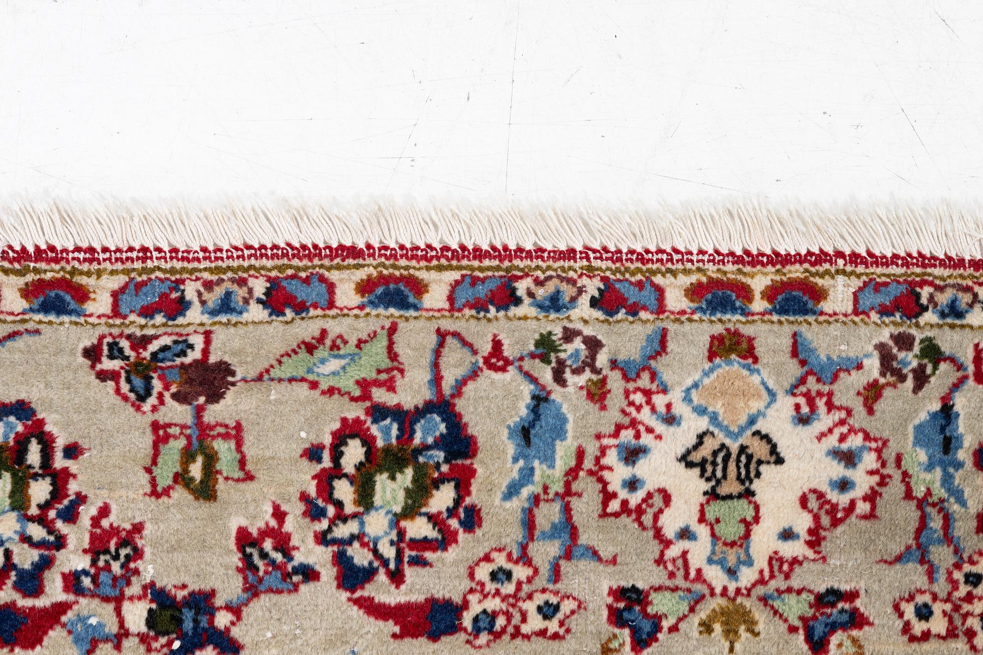 A Najafabad carpet, c. 293 x 202 cm.
