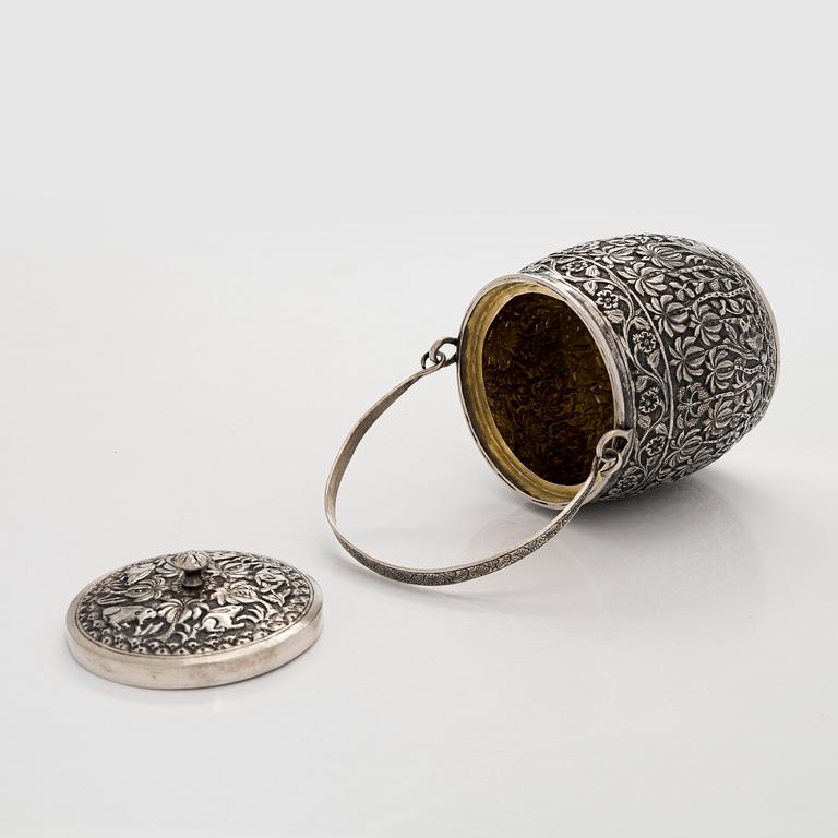 A late 19th-century silver parcel-gilt jar, India.