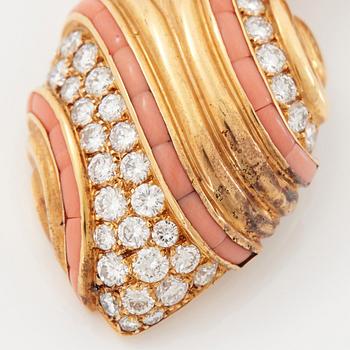 A pair of 18K gold Boucheron earrings set with round brilliant-cut diamonds and coral.