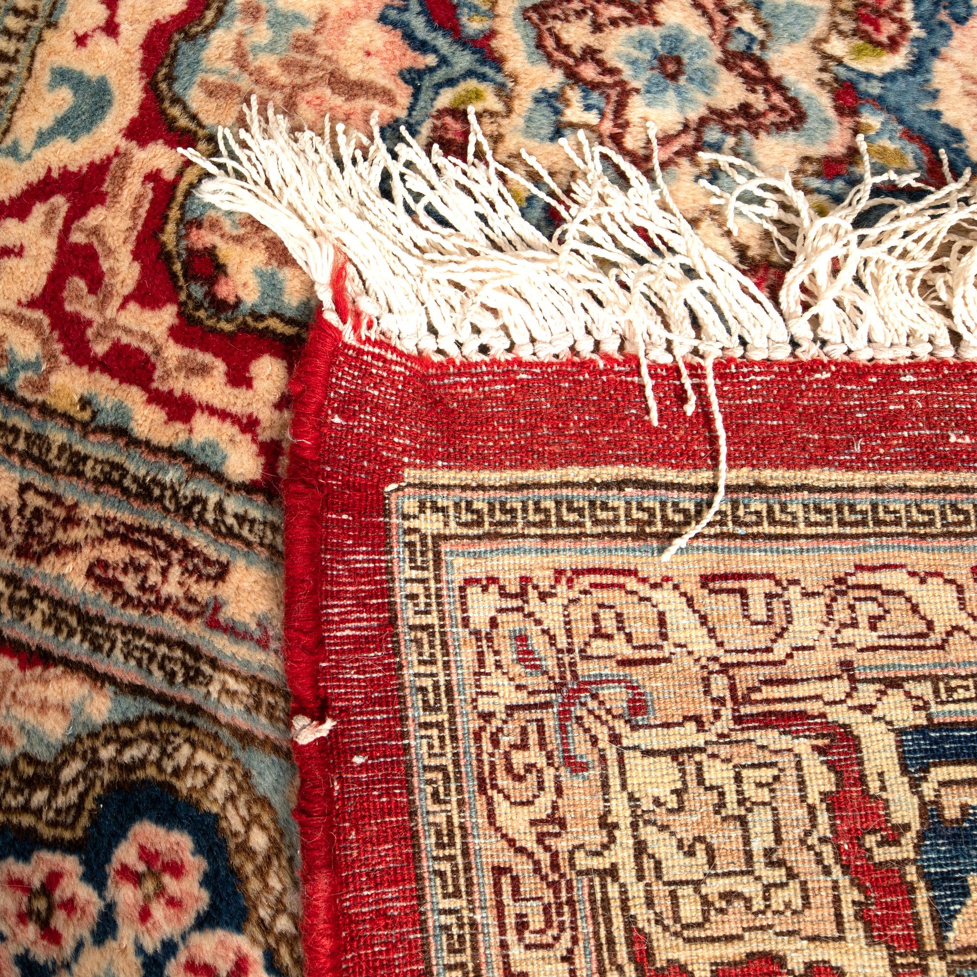 Carpet Kirman semi-antique approx. 380x275 cm.