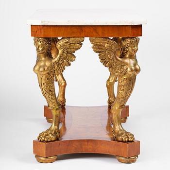 A presumably Austrian Empire centre table, early 19th century.