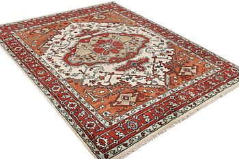 An oriental carpet, c. 296 x 238 cm.