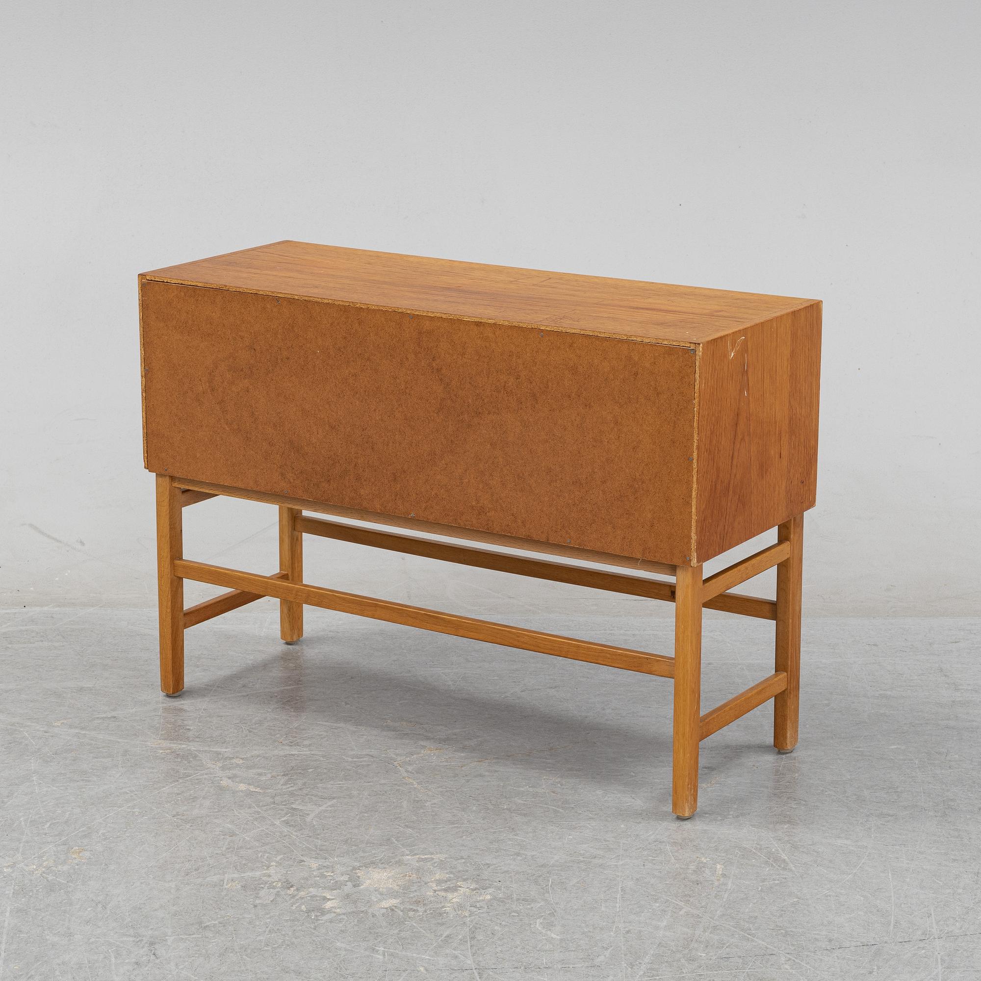 A 1950's/60's teak veneered chest of drawers.