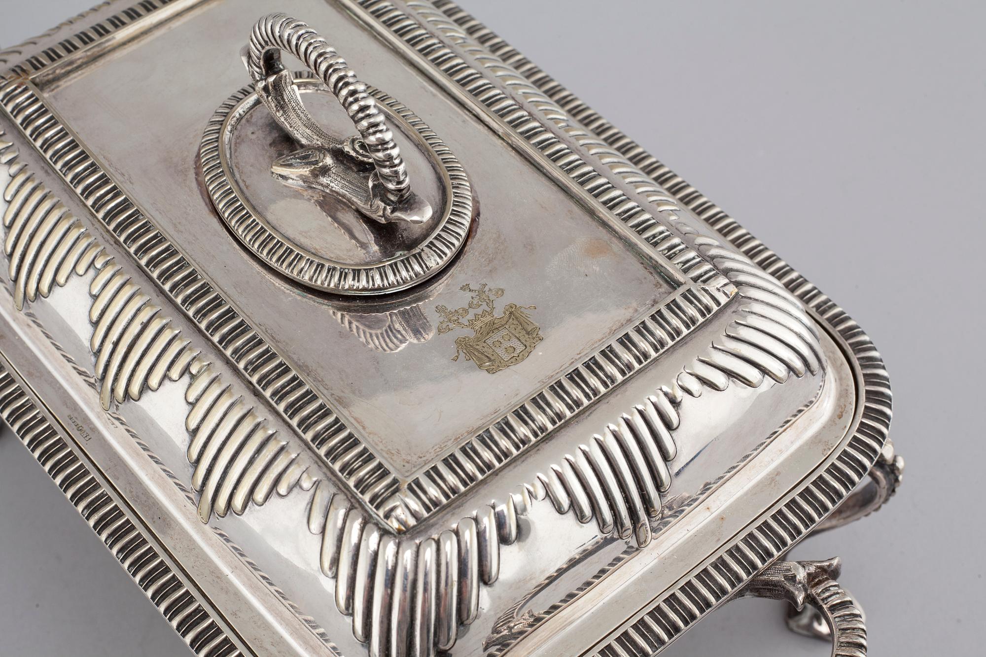 A silvered metal serving dish with rechaud, first half of the 20th century.