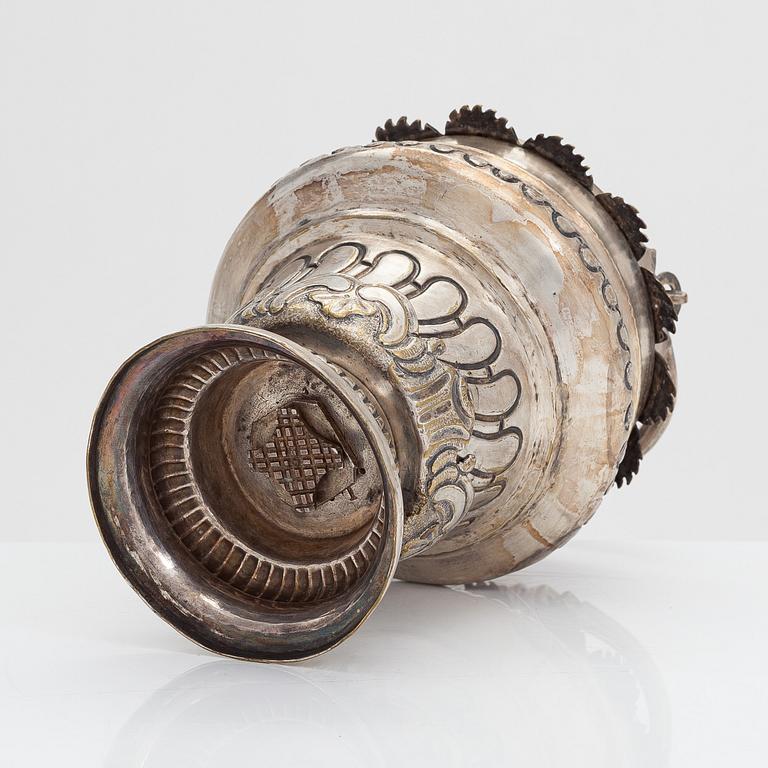 A silver plated brass Holy water bowl stamped L.G and dated 1774.