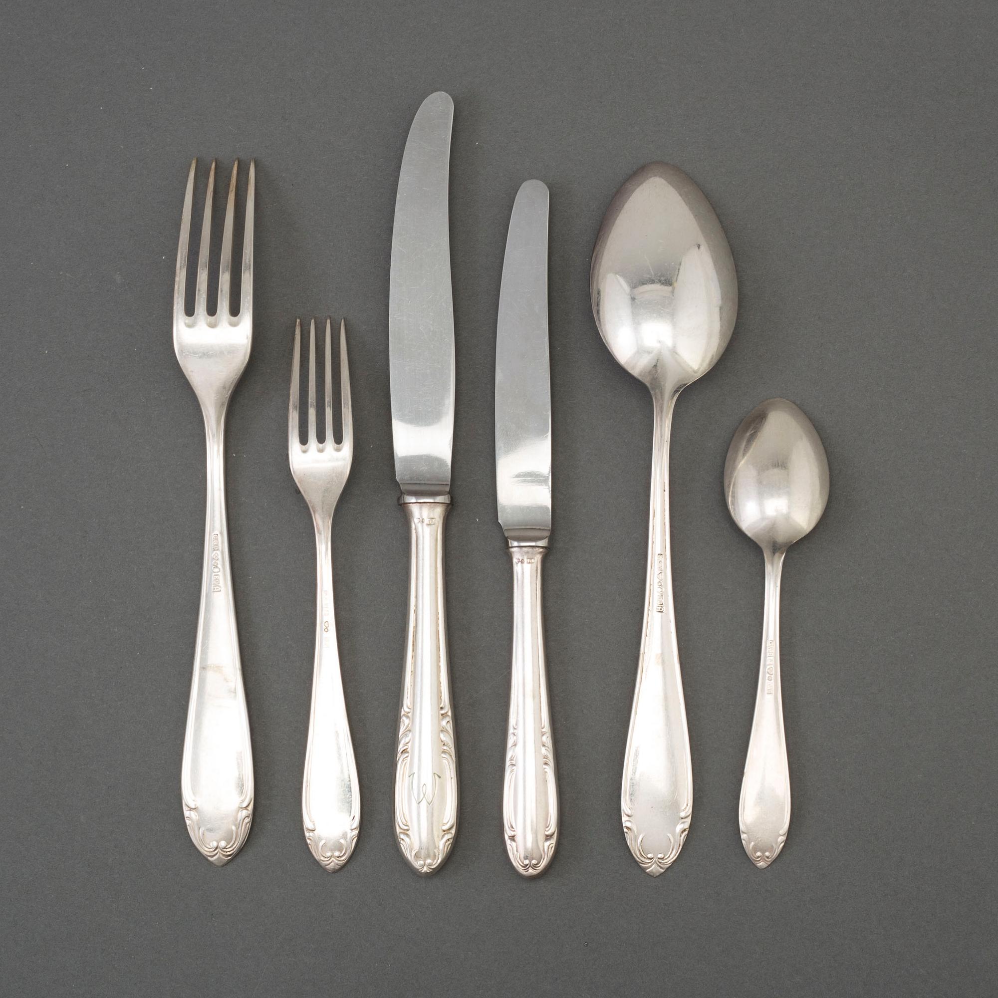 A mid 20th century 109 part silver cutlery set.