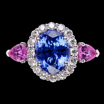 870. A tanzanite, 3.27 cts, pink sapphire and diamond ring.