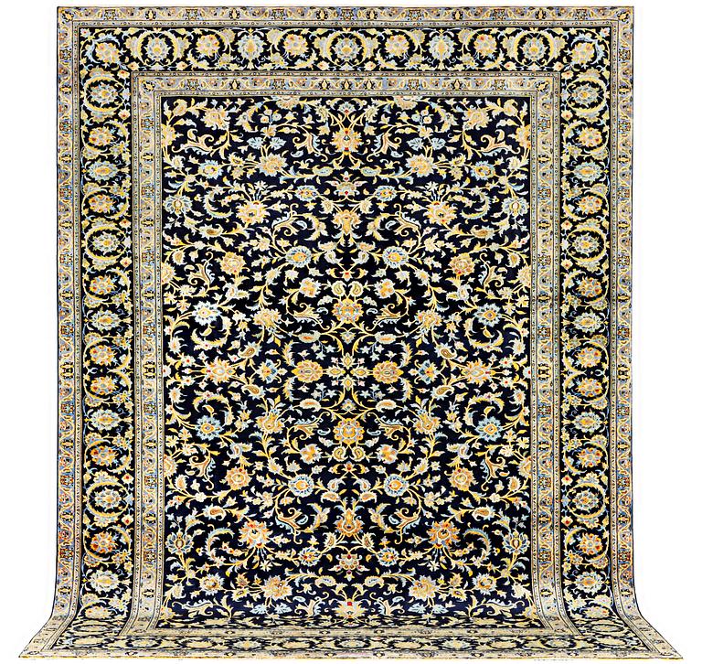 A Kashan carpet, a. 385 x 287 cm.