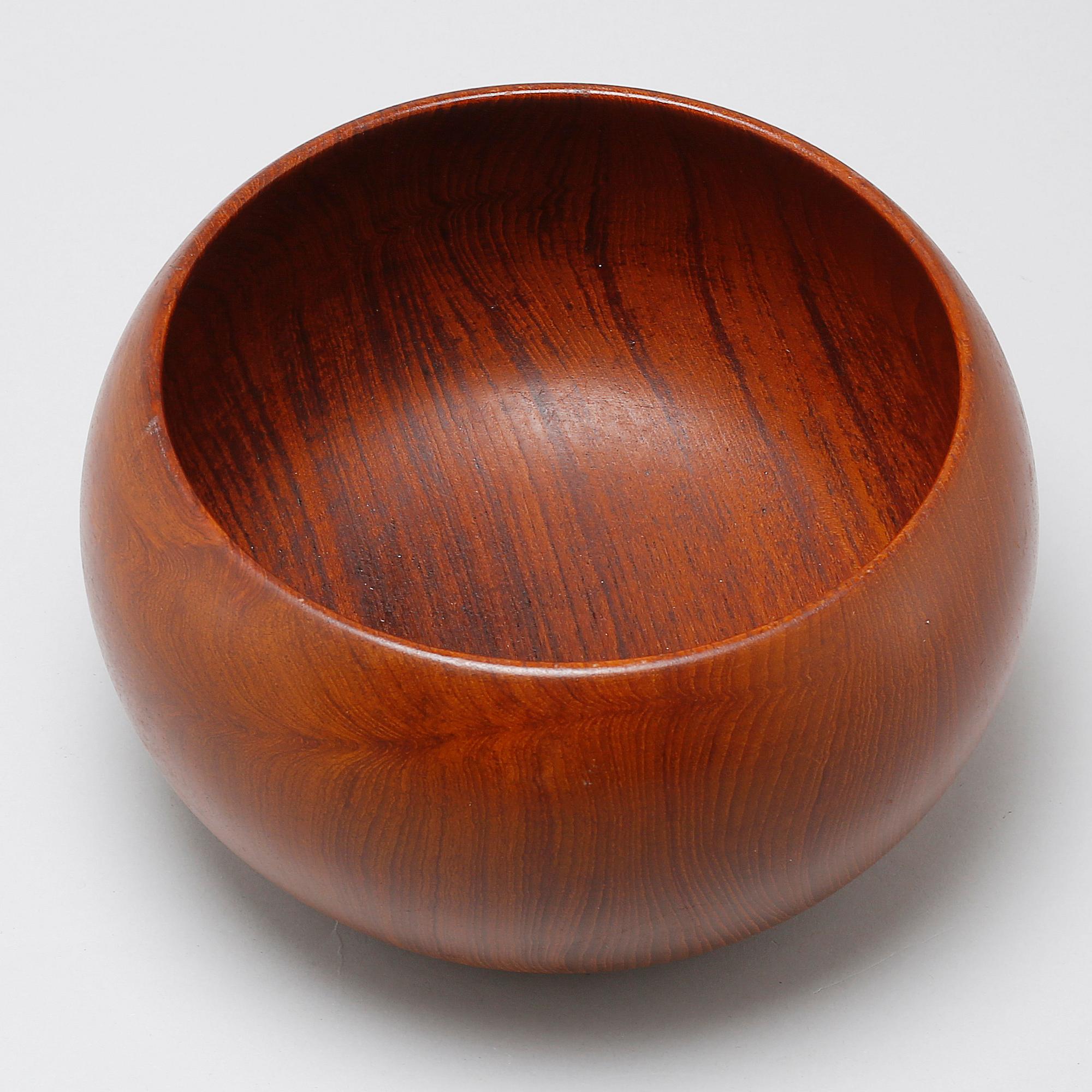 A wooden bowl, designed by Kay Bojesen.