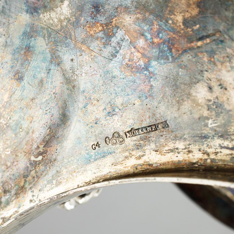 A silver bottle stand, by Gustaf Möllenborg (active 1823-1850), 1837. Weight 1236 g.