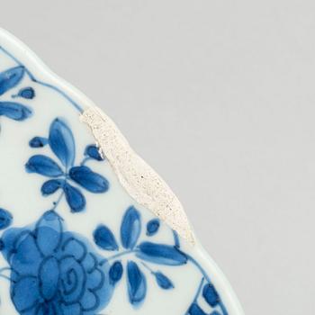 A large blue and white deep dish, Qing dynasty, with Kangxi six character mark and period (1662-1722).