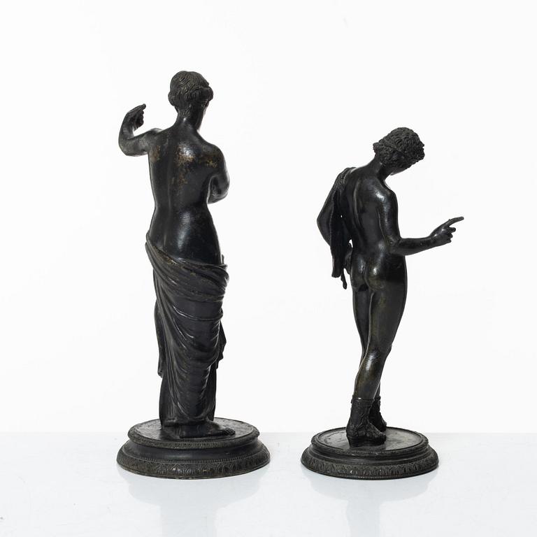Two bronze sculptures.