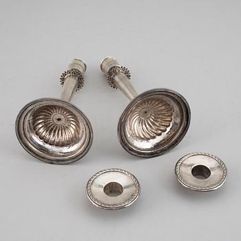A pair of Empire silver candle sticks, 1823.