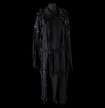 627. A black coat by Gucci.