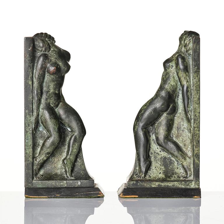 Axel Gute, a pair of Swedish Grace patinated bronze bookends, 1920s.