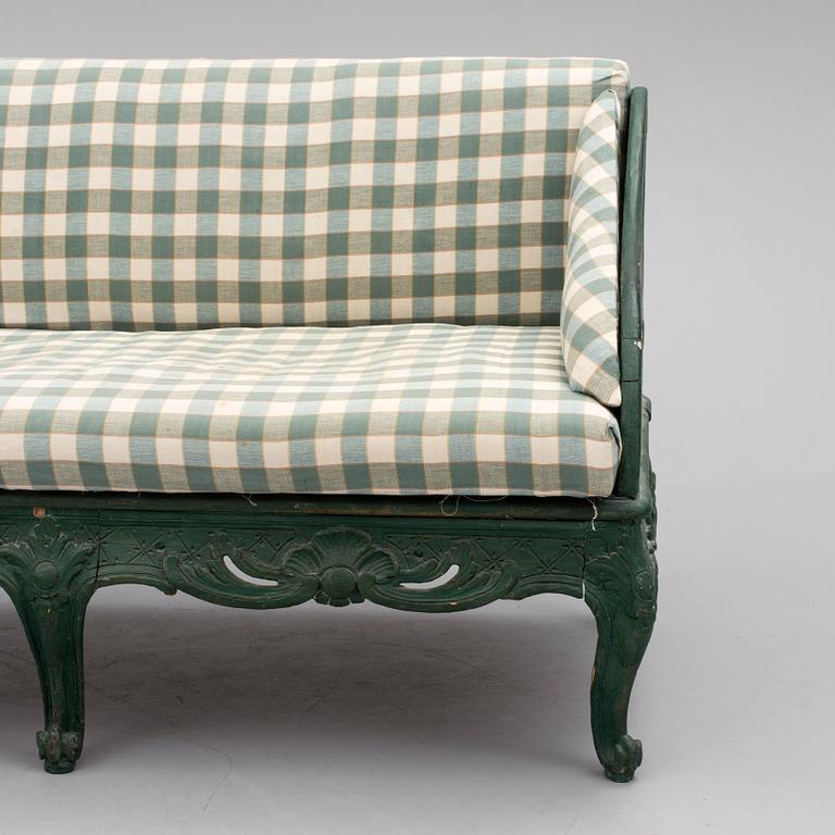 A mid 18th century rococo sofa.