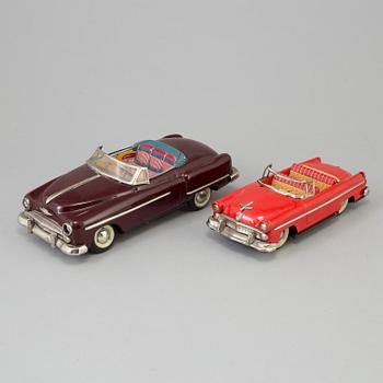 Four toy cars by Tekno and Haji, Germany and Japan.