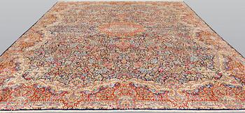 A Kerman carpet of 'Millefleur' desig, c 386 x 303.
