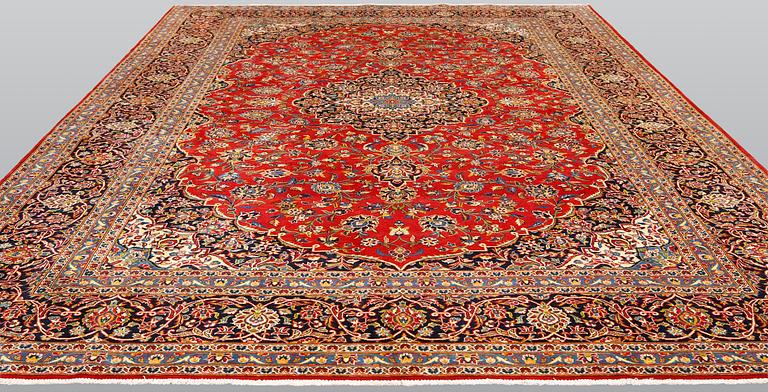 A carpet, Kashan signed, ca 425 x 304 cm.