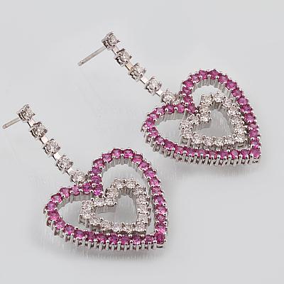 ÖRHÄNGEN, 18K vitguld med briljantslipade diamanter samt rosa safirer. Vikt 22,4 gram.