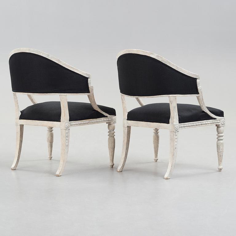 A pair of late Gustavian early 19th century armchairs.