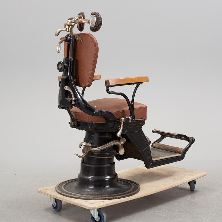 A dental chair, circa 1900.