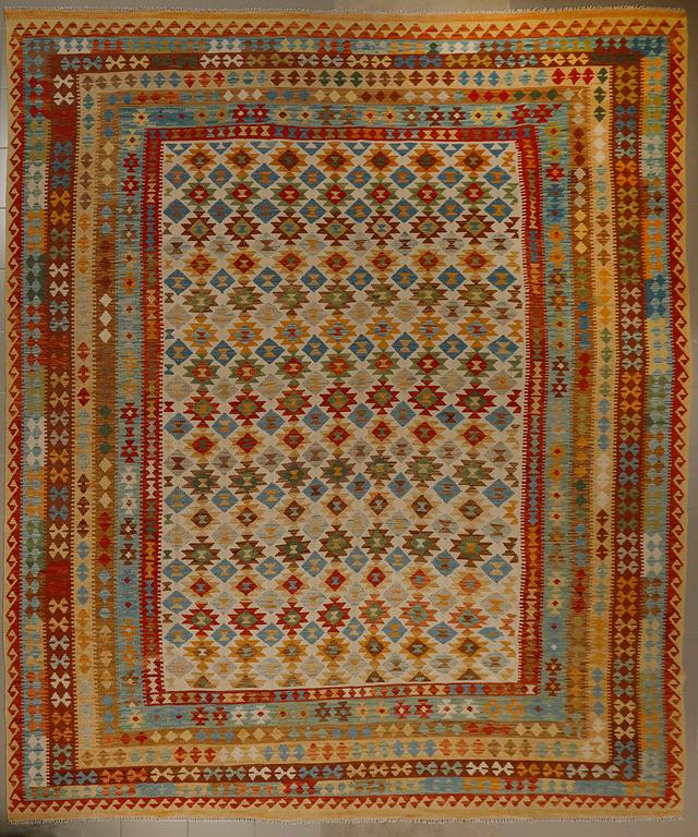 A kelim rug, 400 x 300 cm.
