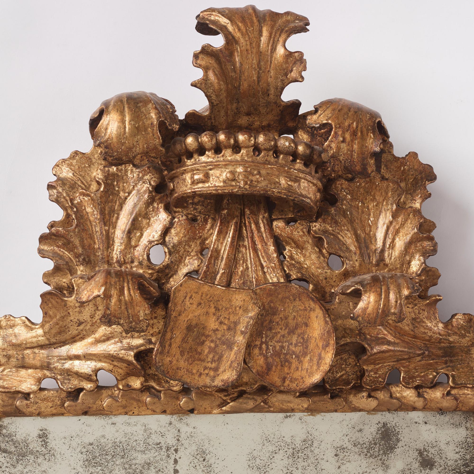 A baroque carved giltwood frame / mirror, circa 1700.