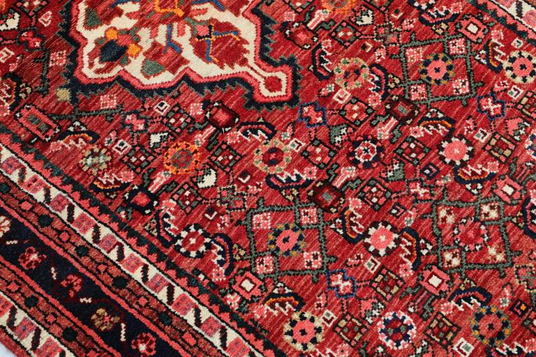 A Hamadan runners carpet, 425 x 103 cm.