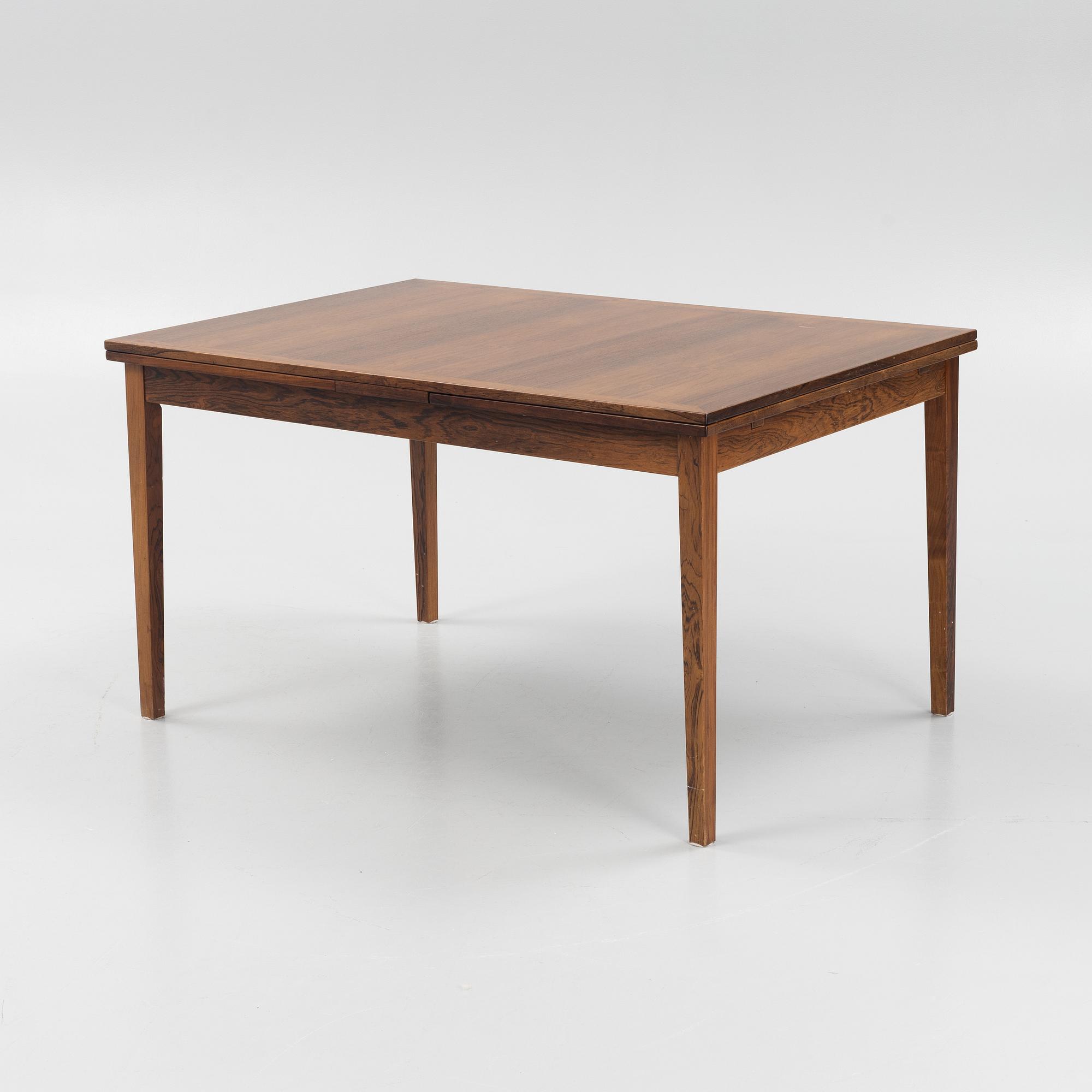 A Danish Dining Table and Six Chairs, 1960s.