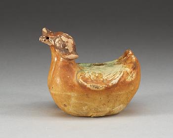 A yellow and green glazed figurine of two mandarin ducks. Ming dynasty ( 1368-1644).