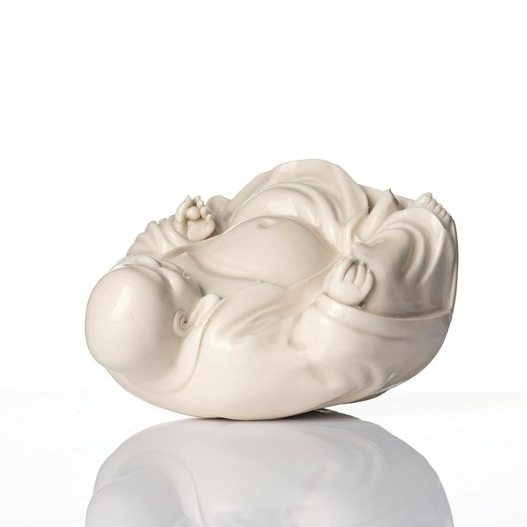 A blanc de chine figure of Budai, Qing dynasty, 18/19th century.
