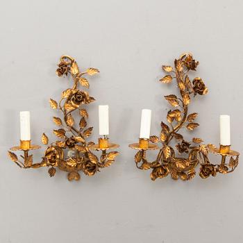 A set of four bronzed Rococo-style walls scones mid 1900s.