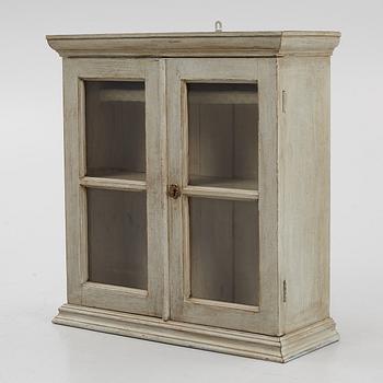 A wall cabinet, late 19th Century.