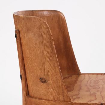 Axel Einar Hjorth, a pair of "Lovö" stained pine armchairs, Nordiska Kompaniet 1930s.