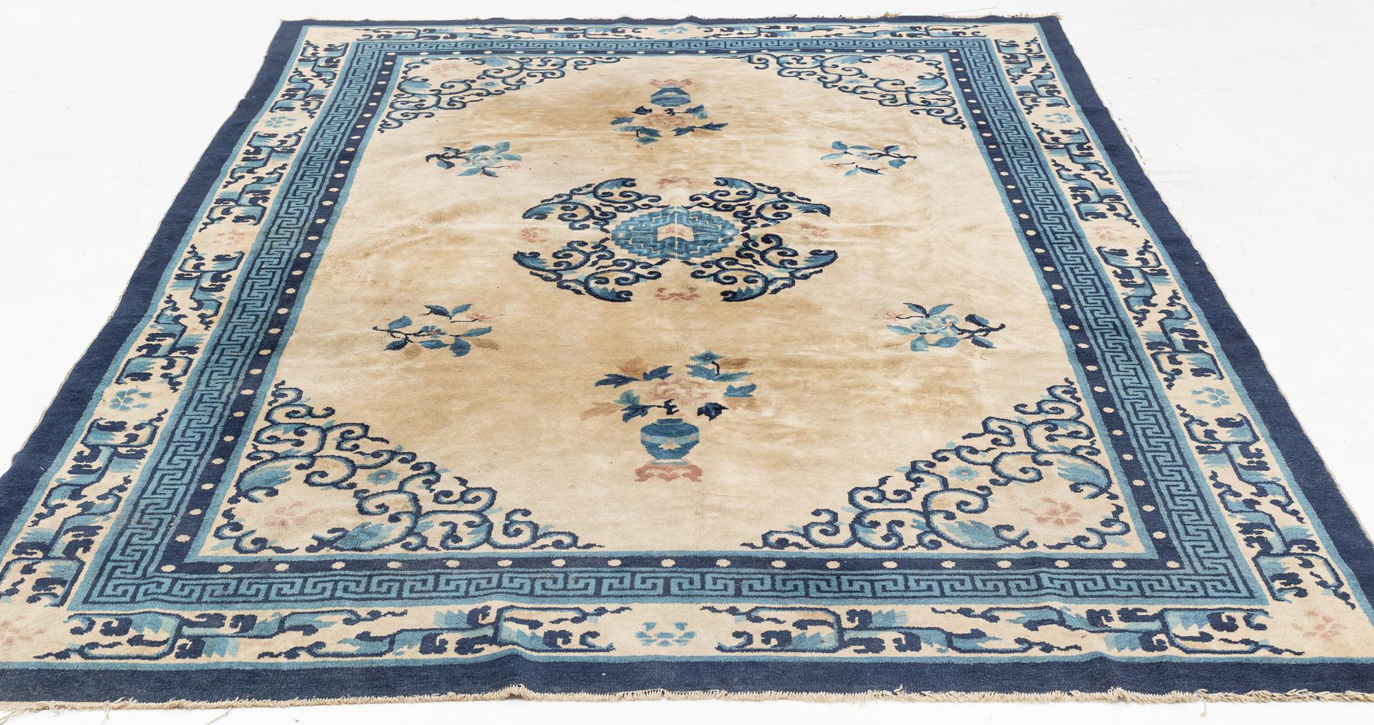 A Chinese Antique Finish rug, c. 278 x 186 cm.